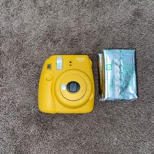 Yellow instax Polaroid camera w/ 20 xtra films